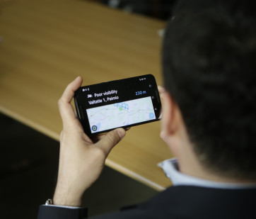 FIA delegate testing the NordicWay traffic control system
