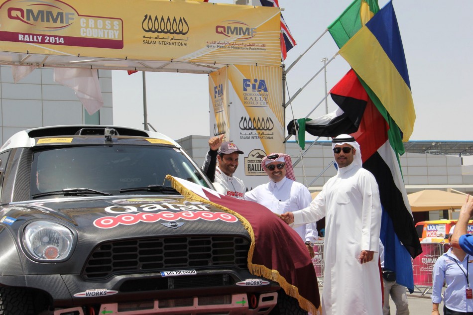  Qatar's Nasser Saleh Al-Attiyah is flagged away from the start of his home event