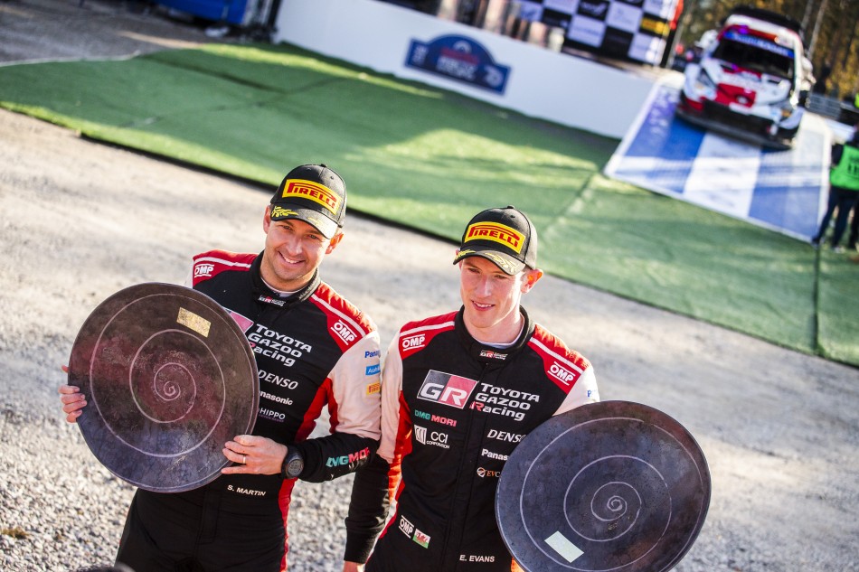 2021 WRC - Rally Finland - Scott Martin (left) and Elfyn Evans at the final event podium