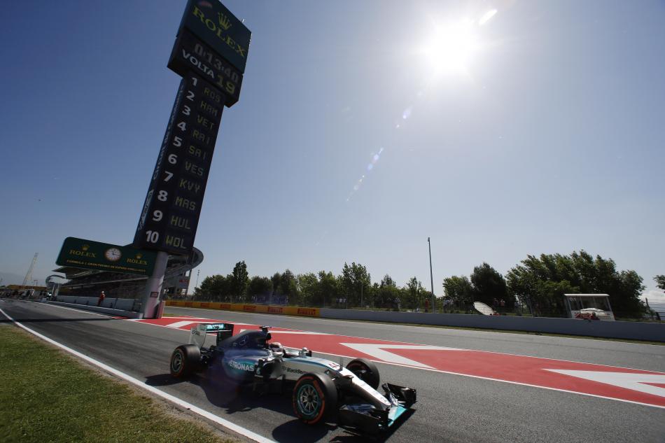 HAMILTON TAKES OVER AT TOP IN SPAIN